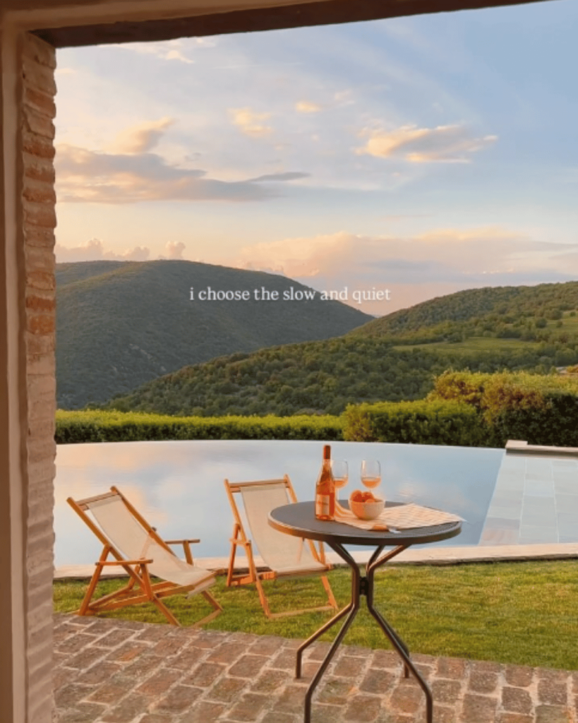 A screenshot of a Tenuta di Murlo Instagram reel featuring the text 'I choose the slow and quiet.' A perfect example of hotel marketing online, showcasing the estate’s tranquil luxury to attract travelers seeking relaxation.